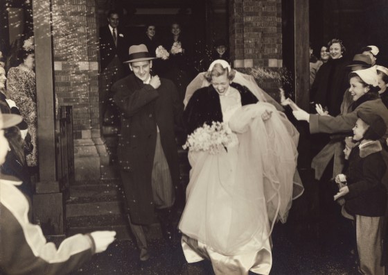 My Dad and Mom walking over the threshold of high expectations on their wedding day.